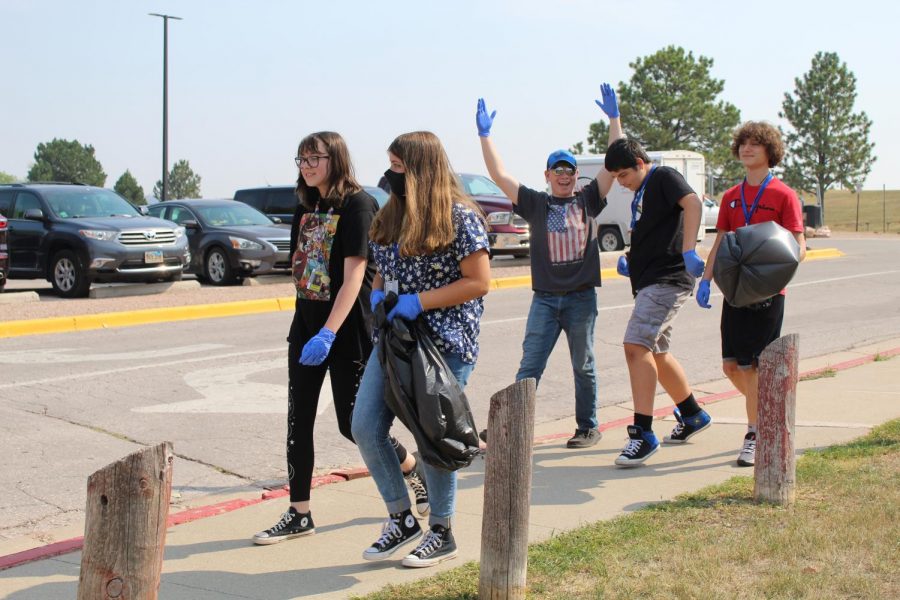 Ag students head out to clean up the parking lots. 