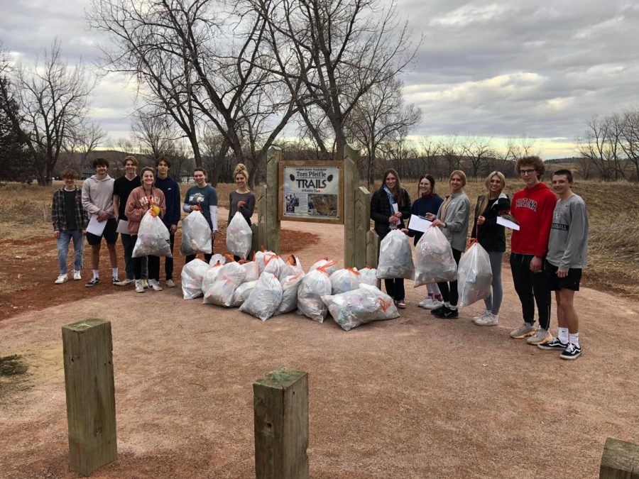 Students from Stevens help to clean up Raider Park. 