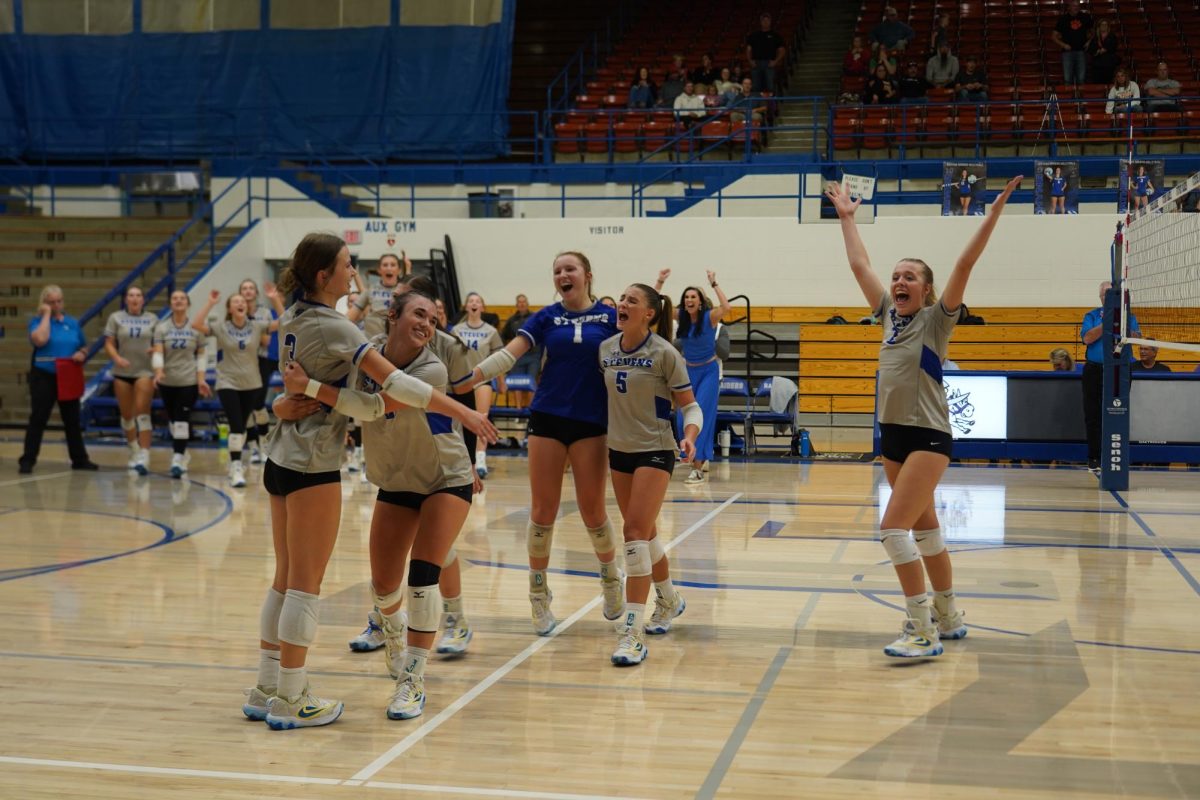 The team celebrated a point against Huron on 10/11/24.