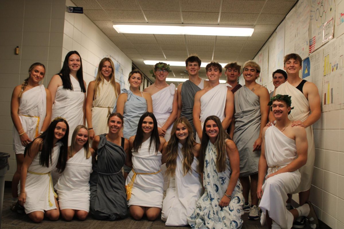 Seniors show off their togas with pride; something they have waited four years to wear.