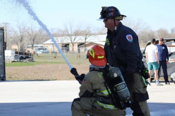 Cadet Kai Unrein and Cadet Mentor Jim Bussel training on hose deployments.