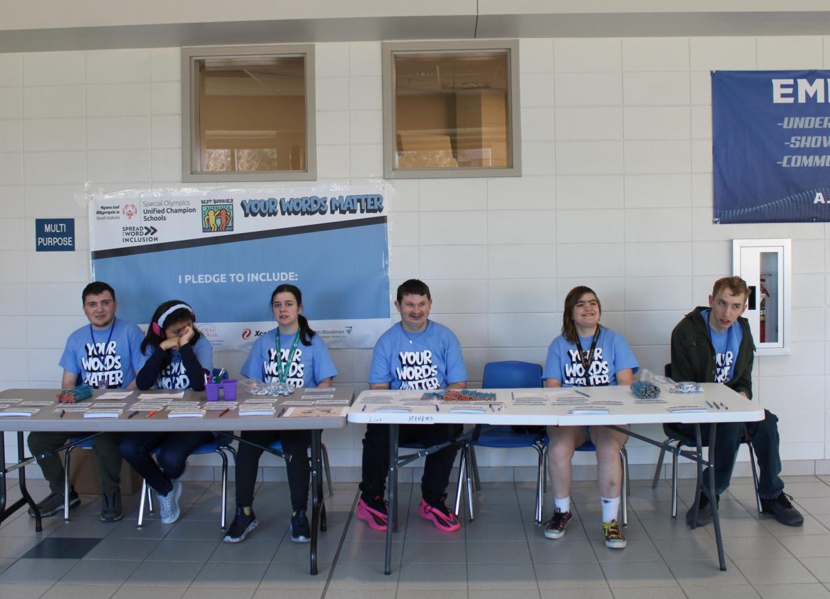 Students from Ms. Britton's room encouraged students to sign the Spread the Word pledge.